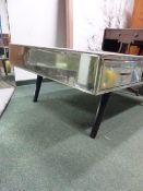 A CONTEMPORARY ART DECO STYLE MIRRORED COFFEE TABLE. 120 x 80cms.