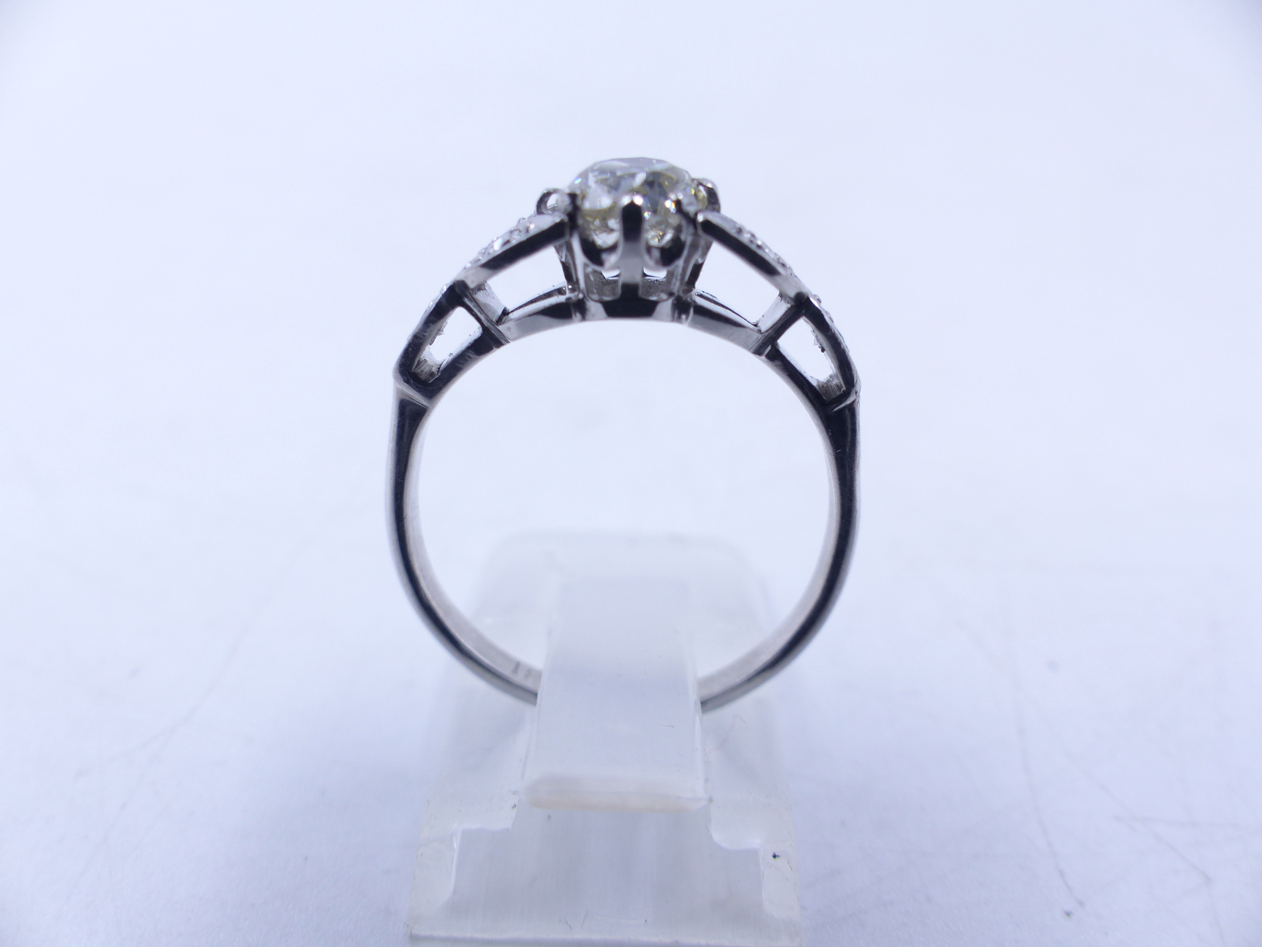 AN 18ct STAMPED OLD CUT DIAMOND RING. THE CENTRAL OLD CUT DIAMOND IS HELD IN AN EIGHT CLAW SETTING - Image 7 of 14