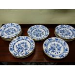 SEVENTEEN MEISSEN ONION PATTERN PLATES, ALL WITH CROSSED SWORD MARK, Dia.24.5cms.