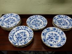 SEVENTEEN MEISSEN ONION PATTERN PLATES, ALL WITH CROSSED SWORD MARK, Dia.24.5cms.