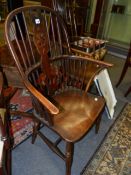 A 19th.C.WINDSOR WHEELBACK ARMCHAIR.