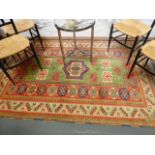 A TURKISH RUG OF CAUCASIAN KAZAK DESIGN. 210 x 148cms.