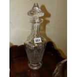 A PAIR OF CUT GLASS DECANTERS. H.33cms. AND A PAIR OF IRISH STYLE GLASS VASES. H.17cms. (4)