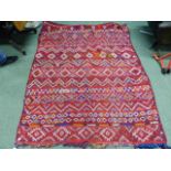 A TRIBAL FLATWEAVE RUG, POSSIBLY NORTH AFFRICAN. 207 x 147cms.