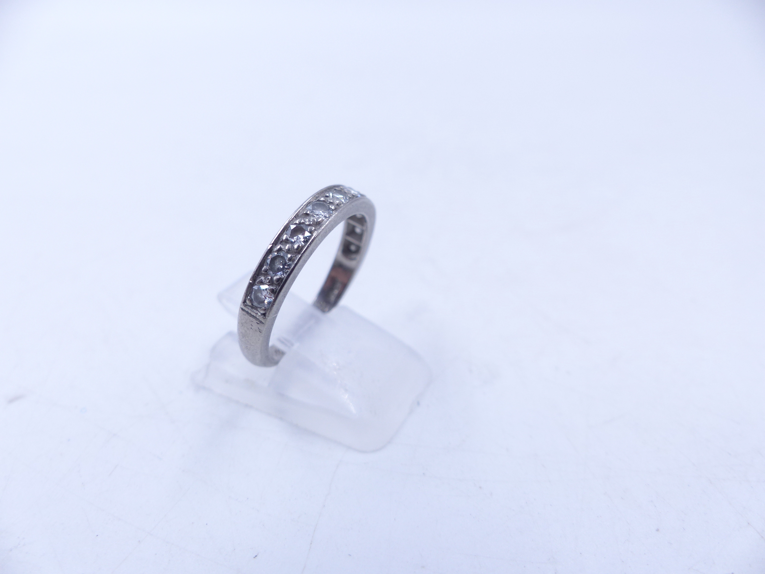 AN 18ct WHITE GOLD DIAMOND HALF ETERNITY RING WITH TEN BRILLIANT CUT PAVE SET DIAMONDS. FINGER - Image 5 of 10