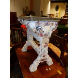 AN UNUSUAL HAND MADE SEA SHELL ENCRUSTED SIDE TABLE. 65 x 45 x 73cms.