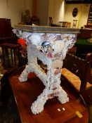 AN UNUSUAL HAND MADE SEA SHELL ENCRUSTED SIDE TABLE. 65 x 45 x 73cms.