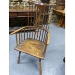 AN 18th.C.COUNTRY COMB BACK ARMCHAIR WITH LATER PIERCED BACK SLAT.