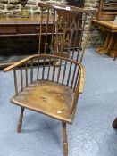 AN 18th.C.COUNTRY COMB BACK ARMCHAIR WITH LATER PIERCED BACK SLAT.