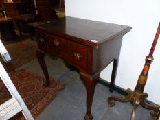 A GEO.III.OAK THREE DRAWER LOW BOY ON SQUARE SECTION CABRIOLE LEGS. W.75cms.