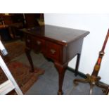 A GEO.III.OAK THREE DRAWER LOW BOY ON SQUARE SECTION CABRIOLE LEGS. W.75cms.