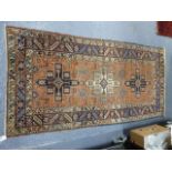 AN ANTIQUE PERSIAN HERIZ RUG. 187 x 94cms.