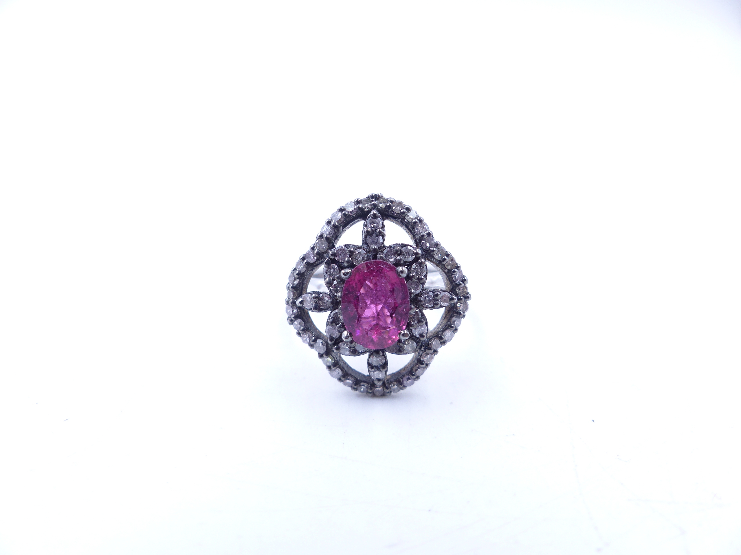 A PINK TOURMALINE AND DIAMOND OPEN WORK FILIGREE RING SET IN A WHITE METAL MOUNT,THE CENTRAL PINK - Image 13 of 17