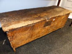 A 17th.C.ELM PLANK COFFER WITH SCRATCH CARVED DECORATION. W.106cms.