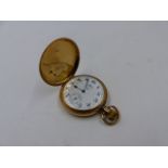 A 9ct YELLOW GOLD FULL HUNTER WALTHAM USA POCKET WATCH, BIRMINGHAM.