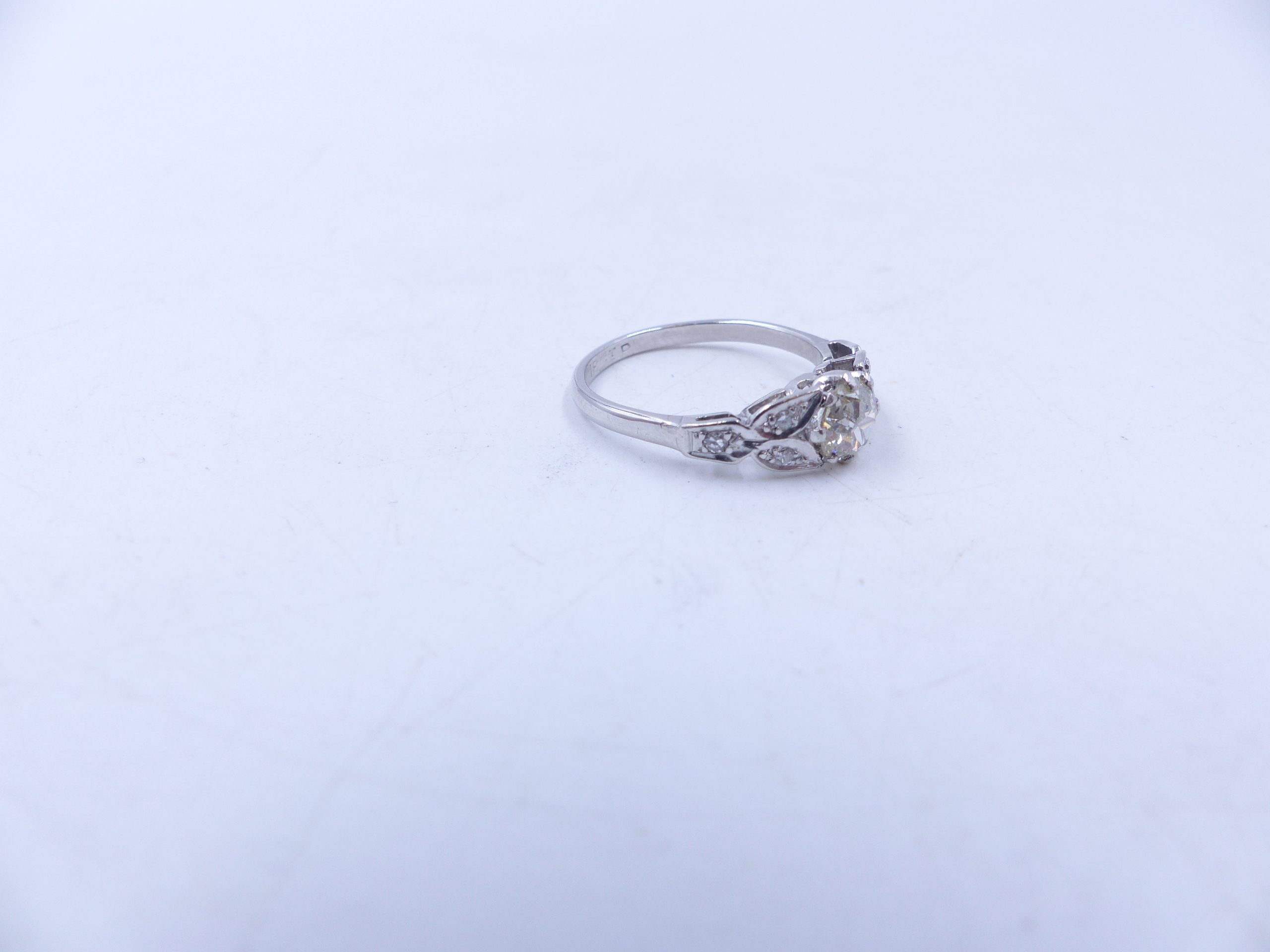 AN 18ct STAMPED OLD CUT DIAMOND RING. THE CENTRAL OLD CUT DIAMOND IS HELD IN AN EIGHT CLAW SETTING - Image 14 of 14
