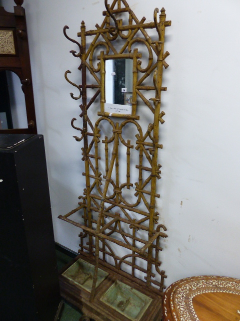 A 19th.C.CAST IRON HALL STAND OF FAUX BAMBOO DESIGN IN THE MANNER OF COALBROOKDALE.