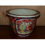 AN UNUSUAL JAPANESE IMARI JARDINIERE WITH RELIEF FIGURAL PANELS, RIBBED FORM WITH TYPICAL