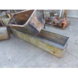 TWO LARGE GALVANISED TROUGHS. LARGEST. 184 x 47cms