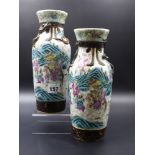 A PAIR OF CHINESE FAMILLE ROSE WARRIOR DECORATED CRACKLE GLAZE VASES WITH APPLIED DRAGON COLLARS AND