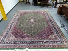 AN ORIENTAL CARPET OF PERSIAN TABRIZ DESIGN. 370 x 276cms.