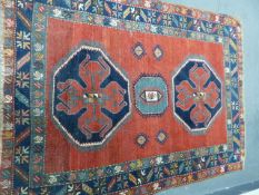 AN ANTIQUE CAUCASIAN KAZAK RUG. 224 x 164cms.