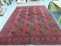 AN ANTIQUE AFGHAN CARPET. 430 x 284cms.