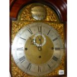 AN 18th.C.MAHOGANY LONGCASE CLOCK WITH ARCHED BRASS DIAL, SILVERED CHAPTER RING AND NAMED ISAAC