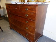 AN EARLY 19th.C.MAHOGANY AND BOXWOOD STRUNG SECRETAIRE CHEST WITH FALL FRONT UPPER DRAWER AND WELL