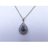 A BLUE AND WHITE DIAMOND PEAR SHAPE DROP PENDANT. THE MULTI-COLOUR DIAMONDS ARE IN A PAVE SETTING