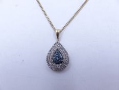 A BLUE AND WHITE DIAMOND PEAR SHAPE DROP PENDANT. THE MULTI-COLOUR DIAMONDS ARE IN A PAVE SETTING