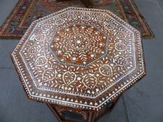 A GOOD INDIAN HARDWOOD AND IVORY INLAID OCTAGONAL OCCASIONAL TABLE WITH PIERCED DECORATION TO THE