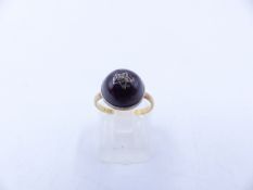 AN ANTIQUE 22ct YELLOW GOLD CABOCHON GARNET AND OLD CUT DIAMOND STAR BURST RING. FINGER SIZE J.