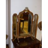 A QUEEN ANNE STYLE WALNUT FRAMED TRIPTYCHE DRESSING TABLE MIRROR.