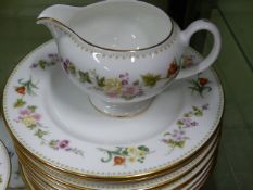 AN EXTENSIVE WEDGWOOD MIRABELLE PATTERN PART DINNER SERVICE TO INCLUDE SERVING PIECES, CUPS AND