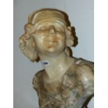 AN ART DECO FRENCH CARVED MARBLE BUST OF A YOUNG SOCIETY GIRL. H.52cms.