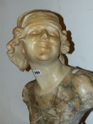 AN ART DECO FRENCH CARVED MARBLE BUST OF A YOUNG SOCIETY GIRL. H.52cms.
