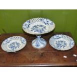 A MEISSEN ONION PATTERN COMPORT WITH PIERCED BORDER Dia.29cms AND A PAIR OF SIMILAR PLATES, ALL WITH