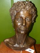 A CONTEMPORARY BRONZE BUST ON A WOODEN PLINTH BASE SIGNED WITH MONOGRAM A.D.W. OVERALL 47cms.