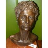 A CONTEMPORARY BRONZE BUST ON A WOODEN PLINTH BASE SIGNED WITH MONOGRAM A.D.W. OVERALL 47cms.