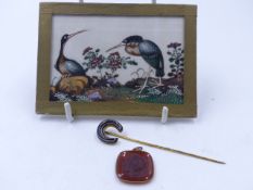 AN INTAGLIO CARVED PENDANT DEPICTING A TROJAN WARRIOR TOGETHER WITH A YELLOW METAL BANDED AGATE