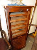 AN OAK TAMBOUR FRONT FILE CABINET. W.50 x H.122cms.