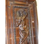 AN IMPRESSIVE PAIR OF 17th/18th.C.CARVINGS DEPICTING CLASSICAL FIGURES, LATER MOUNTED AS DOORS. H.