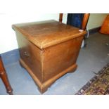 A LATE GEORGIAN OAK BOX ON BRACKET FEET WITH SIDE CARRYING HANDLES. W.45cms.