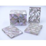 A MOTHER OF PEARL CASKET WITH LOCKING KEY TOGETHER WITH THREE FURTHER MOTHER OF PEARL CARD CASES.