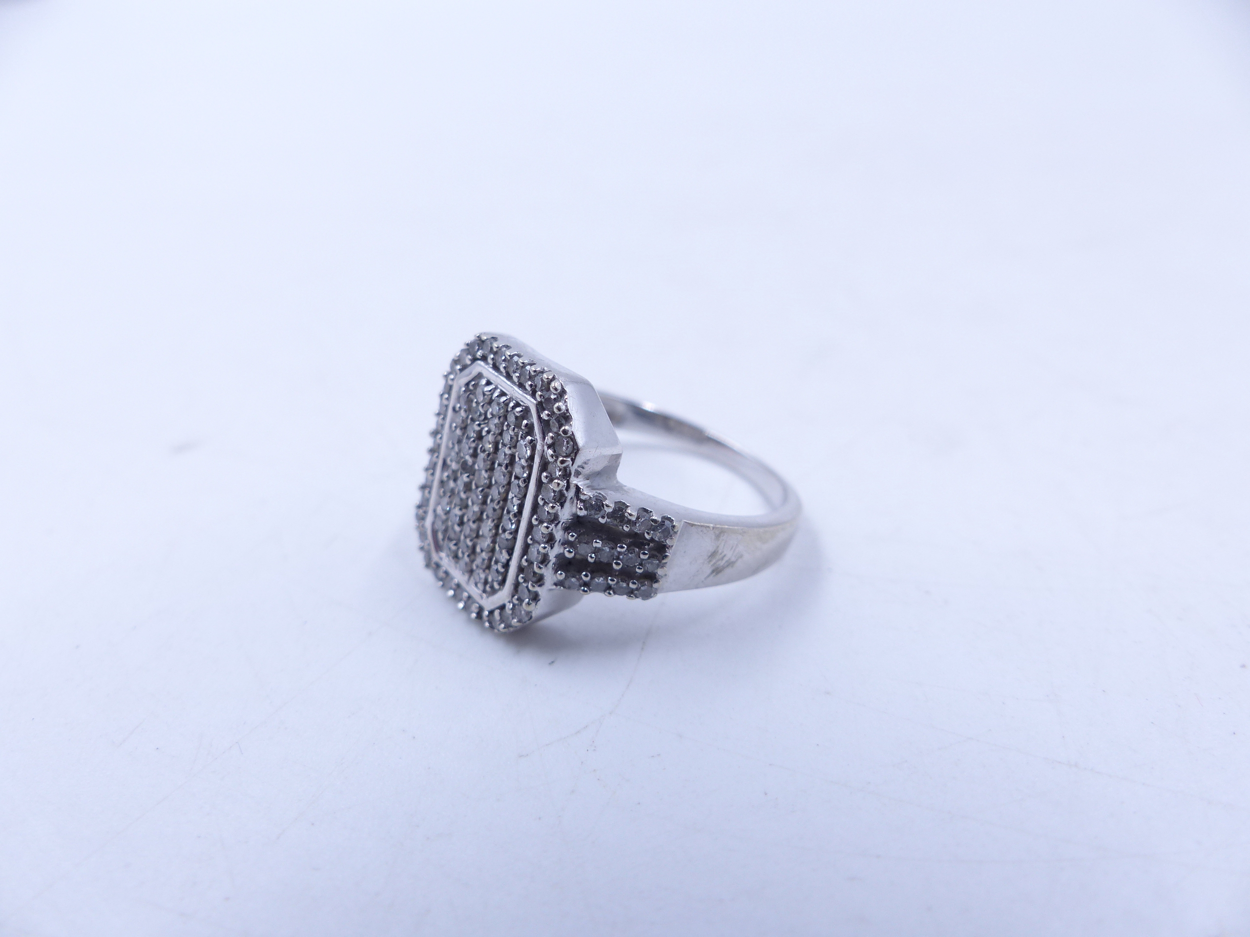 A 9ct WHITE GOLD DIAMOND PAVE SET RING. THE OCTAGONAL HEAD MEASURES 1.5cm X 1.1cm, WEIGHT 4.5grms, - Image 13 of 13