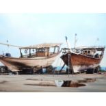 SUE CASSON. (20th/21st.C.) (ARR) BEACHED DHOWS, A SIGNED OIL ON CANVAS. PROV.MATHAF GALLERY LTD.