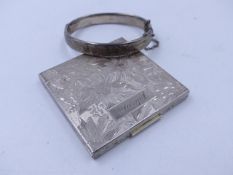 A FLORAL DESIGNED COMPACT STAMPED STERLING, ELGIN AMERICAN, MADE IN USA AND ENGRAVED MARGOT.