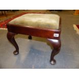 A 19th.C.MAHOGANY FOOTSTOOL ON CABRIOLE LEGS. 45 x 38cms.