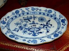 THREE MEISSEN ONION PATTERN OVAL PLATTERS WITH CROSSED SWORD MARK. 39, 45, 52cms